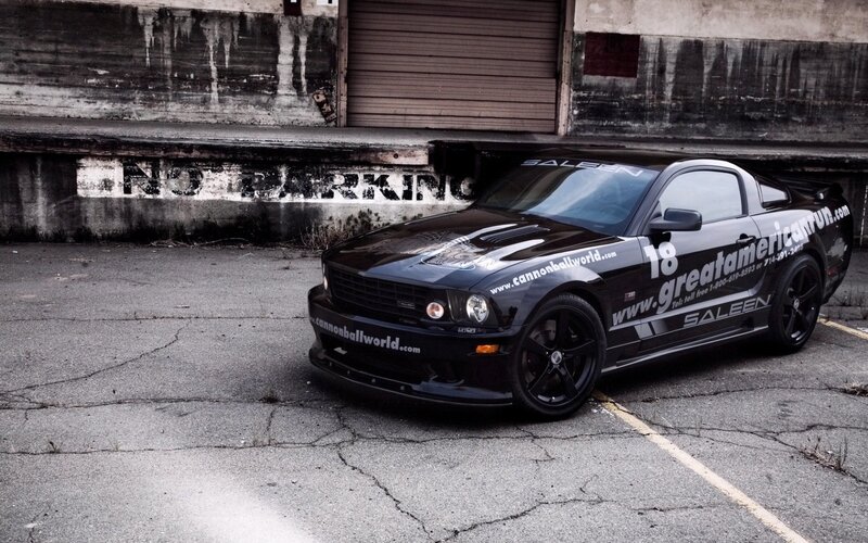black mustang in parking lot