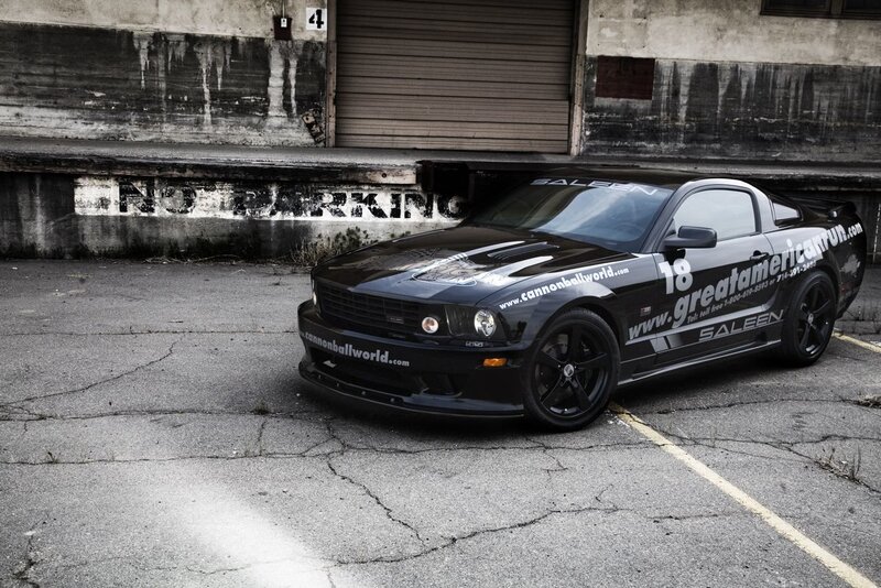 black mustang in parking lot