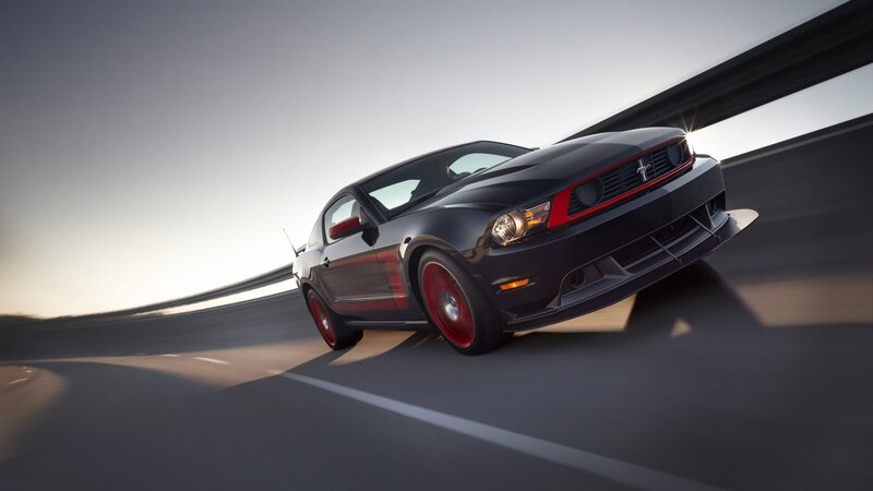 black mustang on a highway
