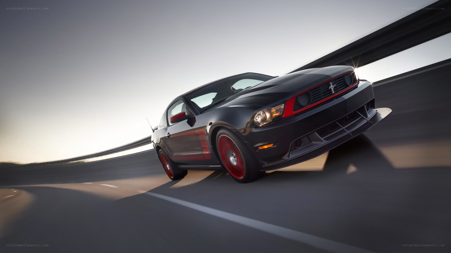 black mustang on a highway