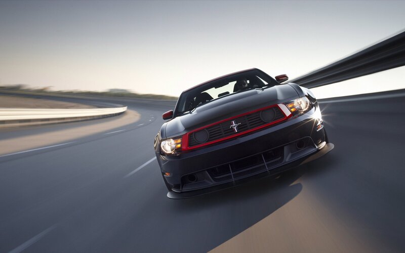 Black Mustang on a racetrack