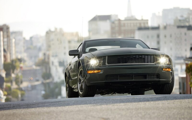 black mustang on city street