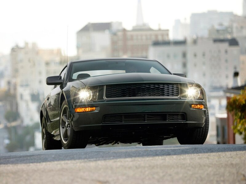 black mustang on city street