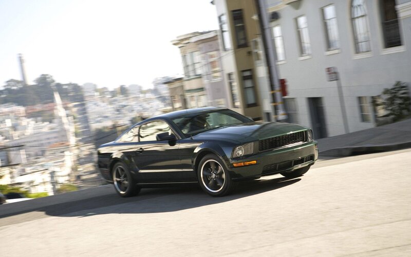 black mustang on city street