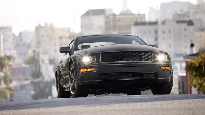 black mustang on city street