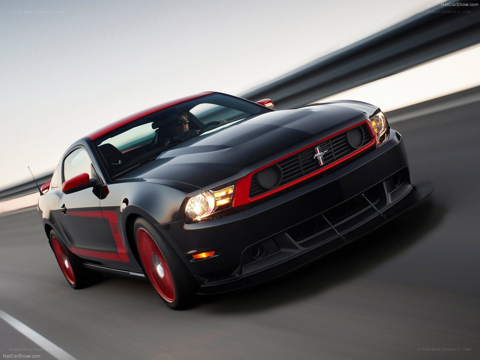black mustang on racetrack