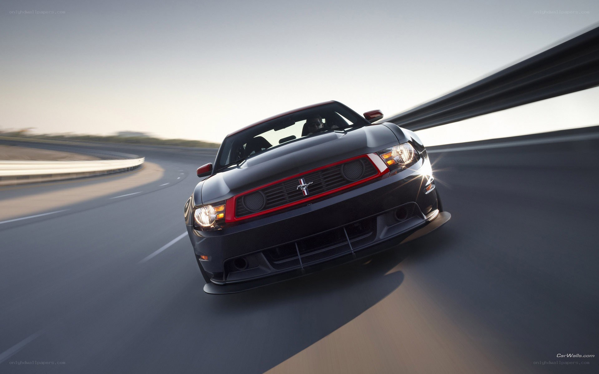 black mustang on racetrack
