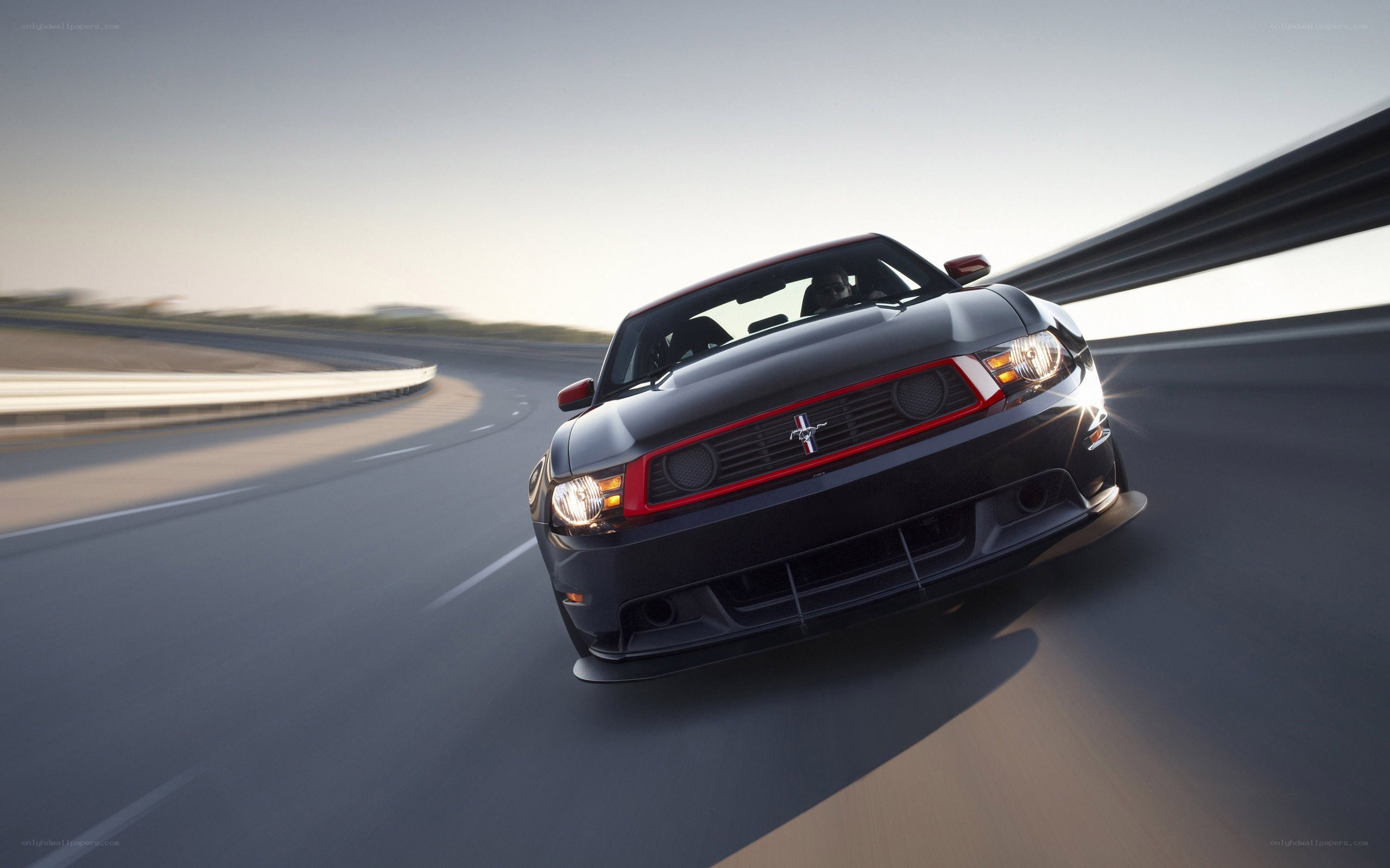 black mustang on racetrack