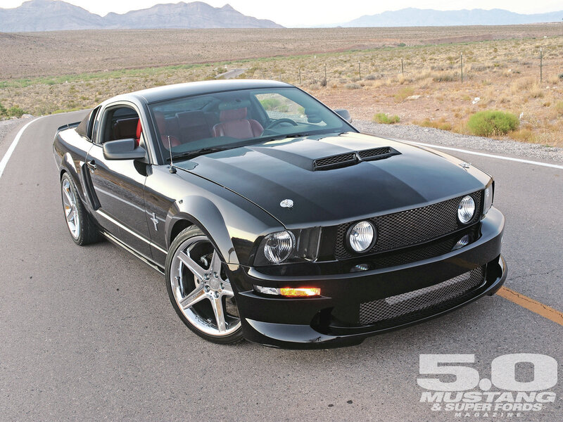 Black Mustang on Road — Dramatic