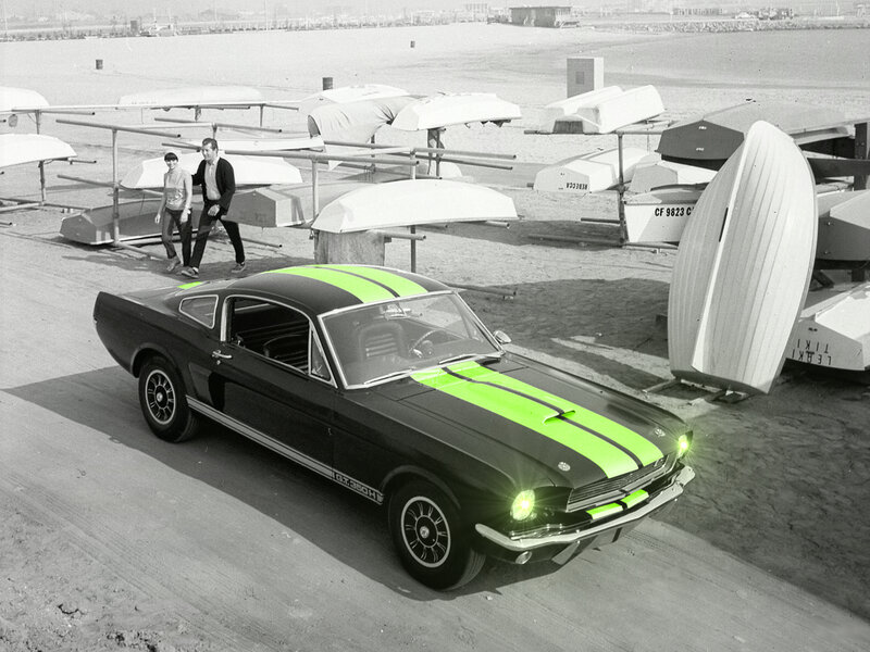 Black Mustang with green stripes