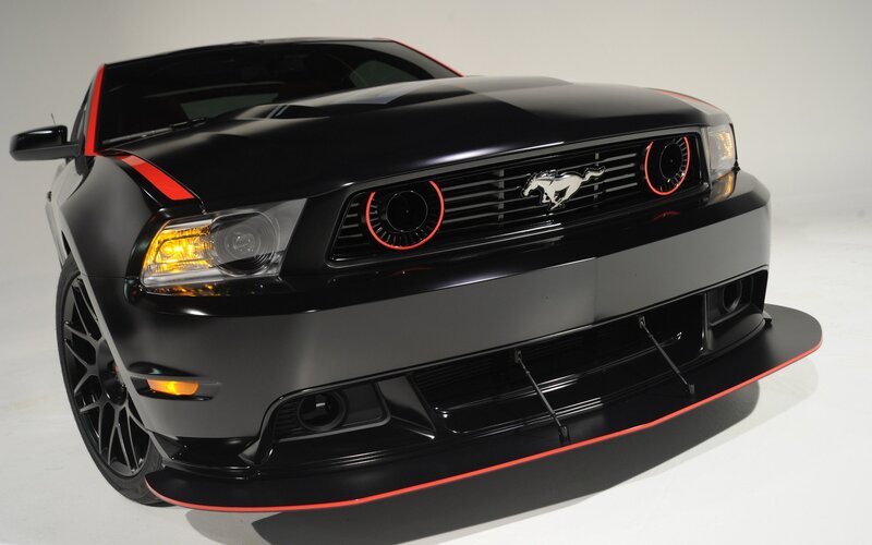 black mustang with red accents