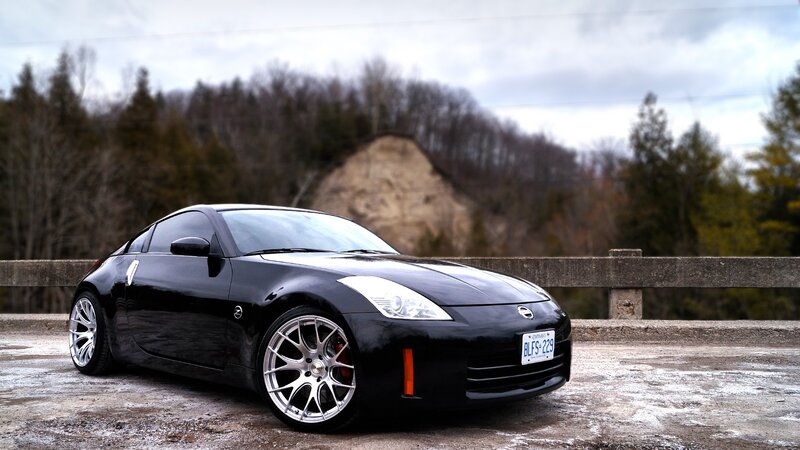 Black Nissan 350Z on a bridge