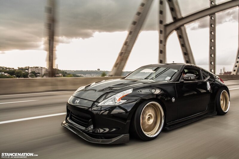 Black Nissan 370Z on a bridge