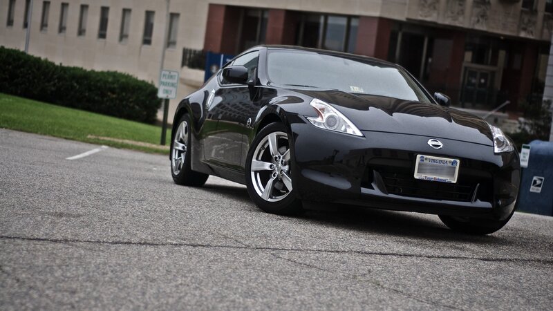 Black Nissan 370Z on a city street