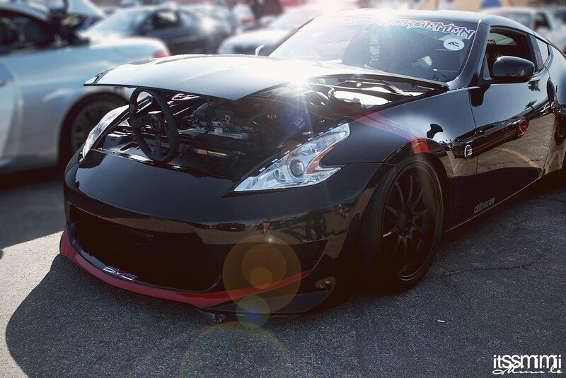 black nissan 370z with open hood