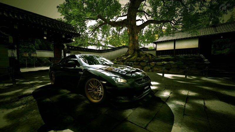 Black Nissan GT-R in a Japanese garden