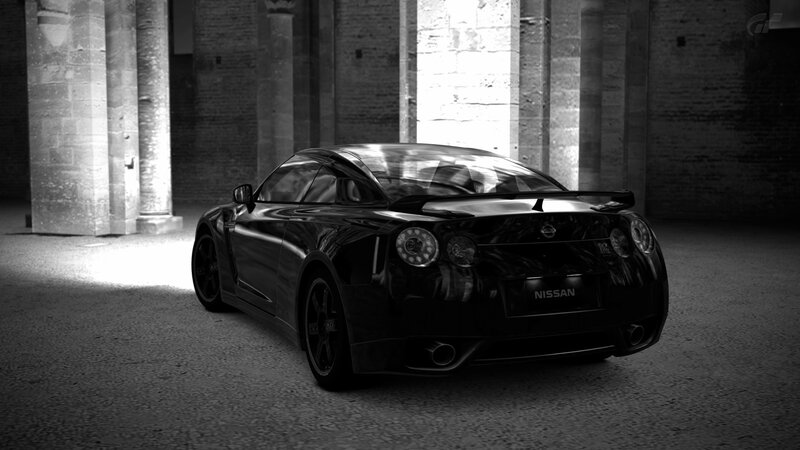 Black Nissan GT-R in a stone hall