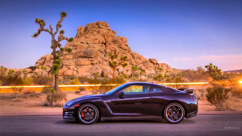 Black Nissan GT-R in desert