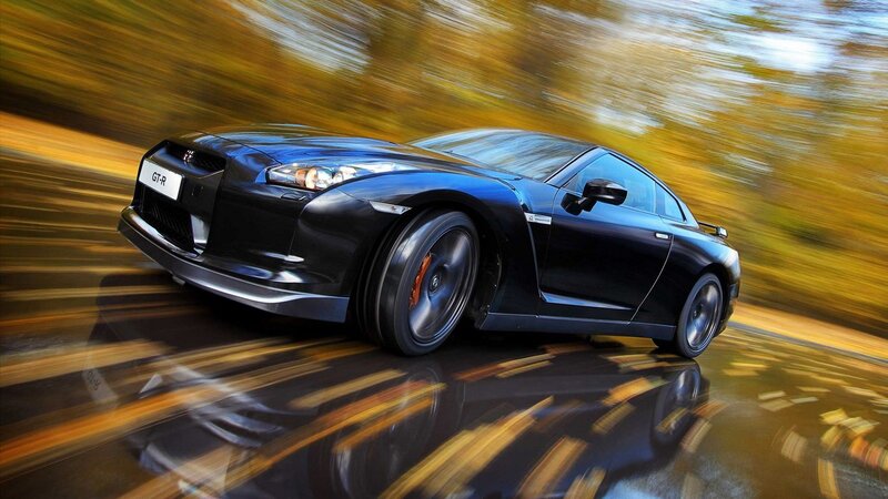 Black Nissan GT-R in motion