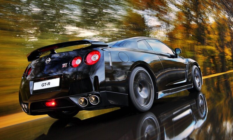 Black Nissan GT-R in motion