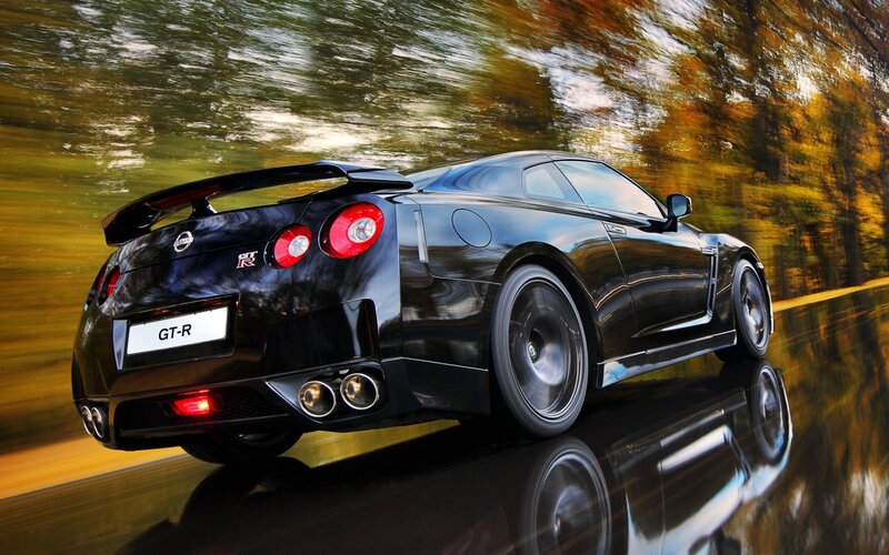 Black Nissan GT-R in motion
