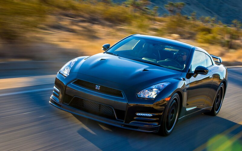 Black Nissan GT-R in motion
