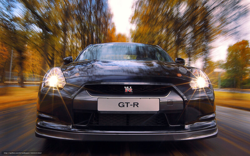 Black Nissan GT-R in motion