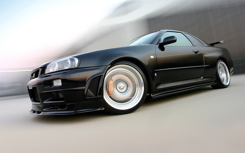 Black Nissan GT-R in motion
