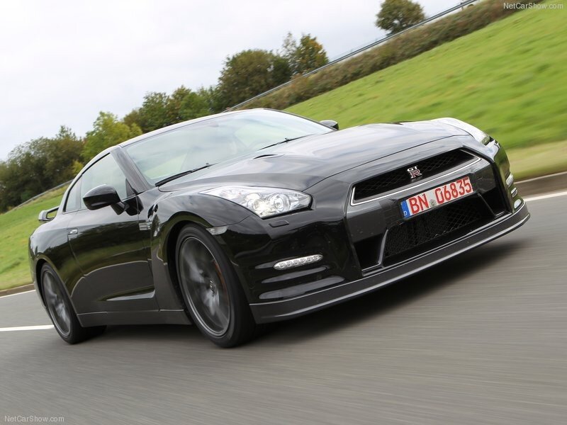Black Nissan GT-R in motion