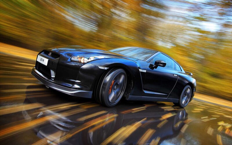 Black Nissan GT-R in motion