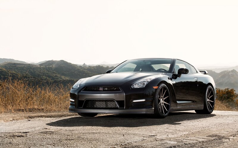 Black Nissan GT-R on a hillside