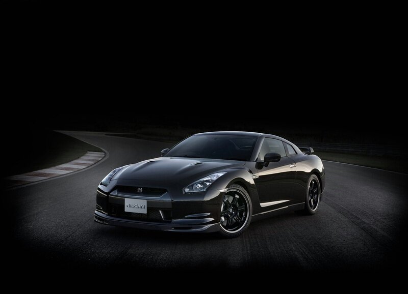 Black Nissan GT-R on a racetrack