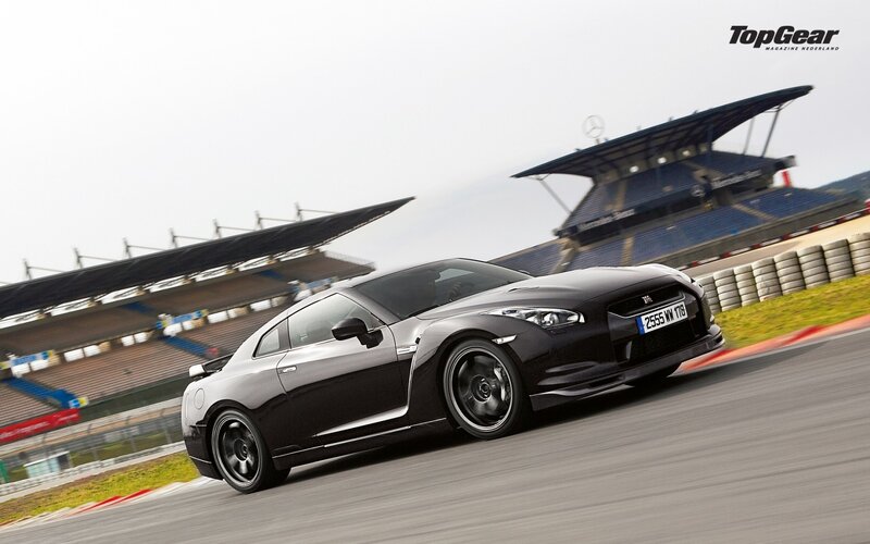 Black Nissan GT-R on a racetrack