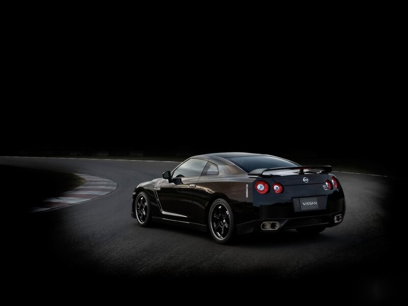 Black Nissan GT-R on a racetrack
