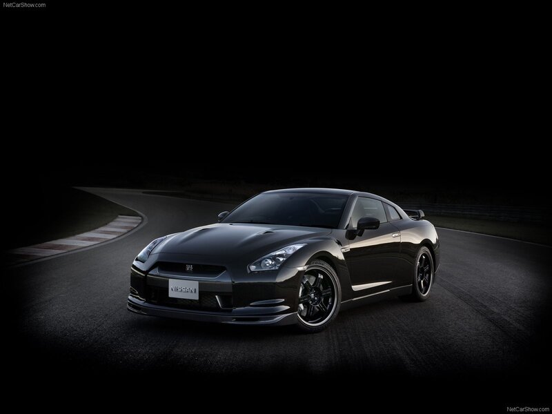 Black Nissan GT-R on a racetrack