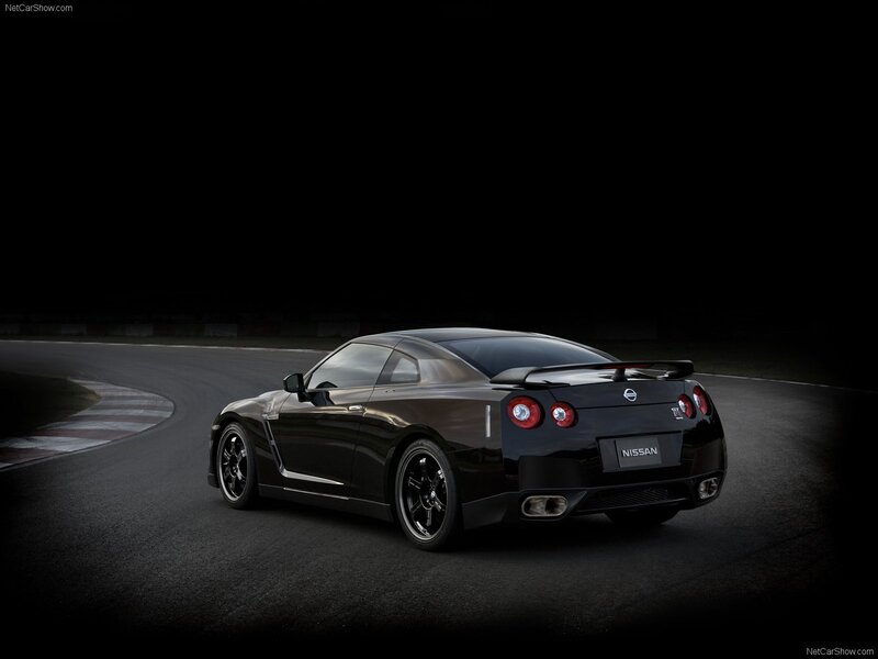 Black Nissan GT-R on a racetrack