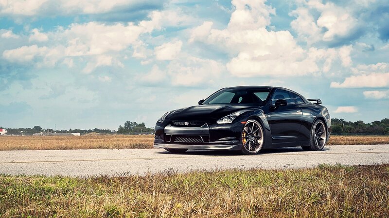 Black Nissan GT-R on a road