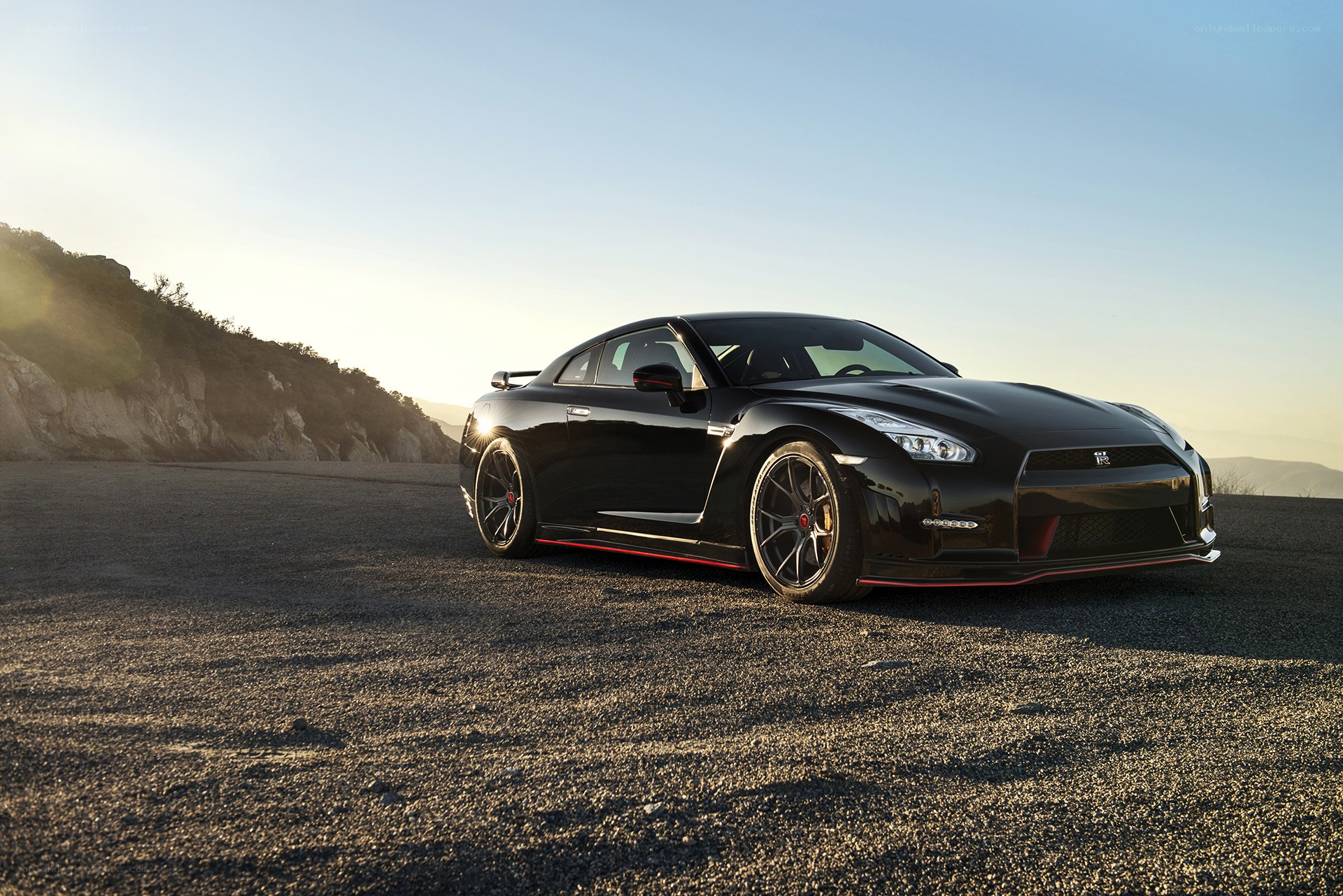 Black Nissan GT-R on a road