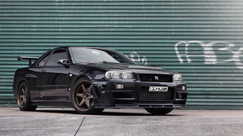 Black Nissan GT-R on concrete