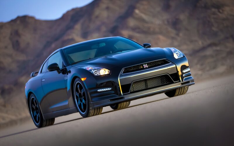 Black Nissan GT-R on desert road