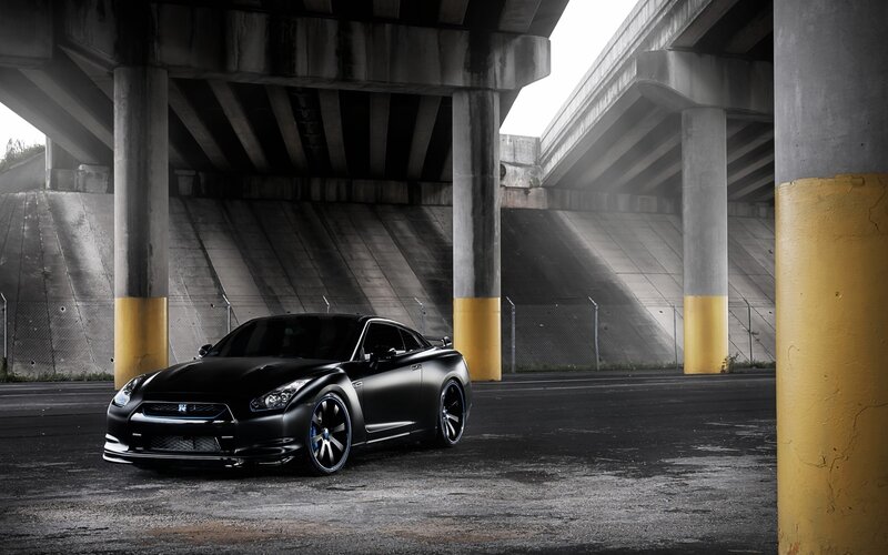 Black Nissan GT-R under highway