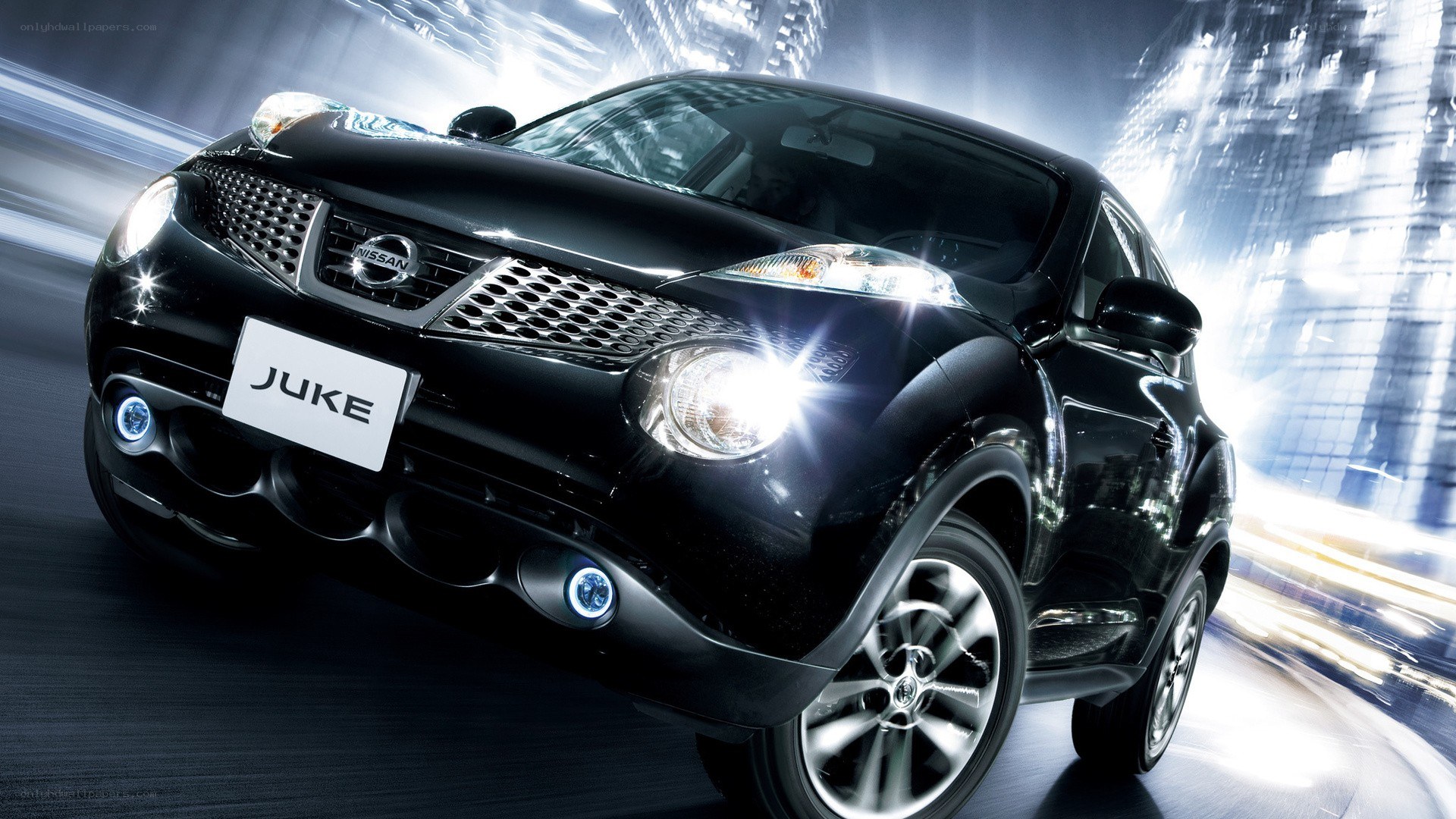 Black Nissan Juke in motion