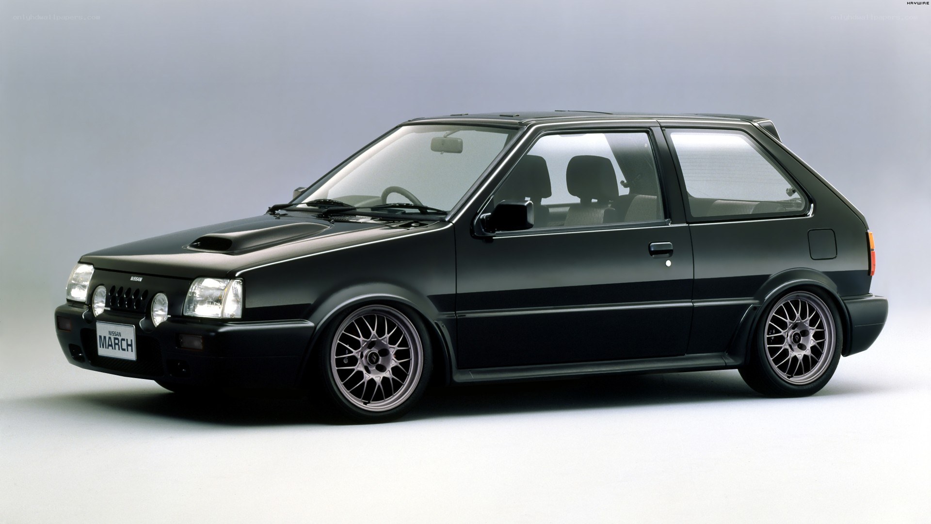 Black Nissan March hatchback