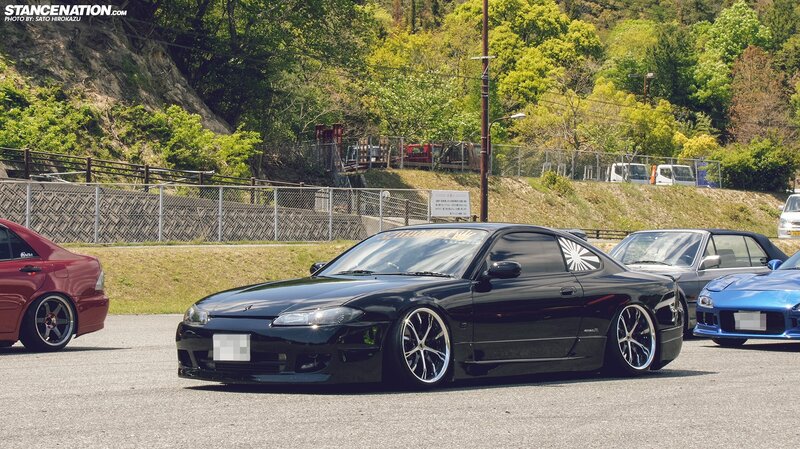 Black Nissan S14 at a car meet
