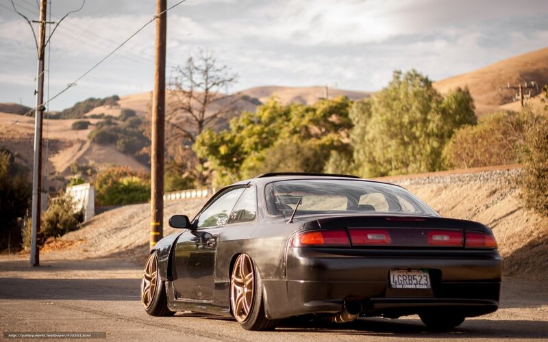 Black Nissan Silvia on a rural road