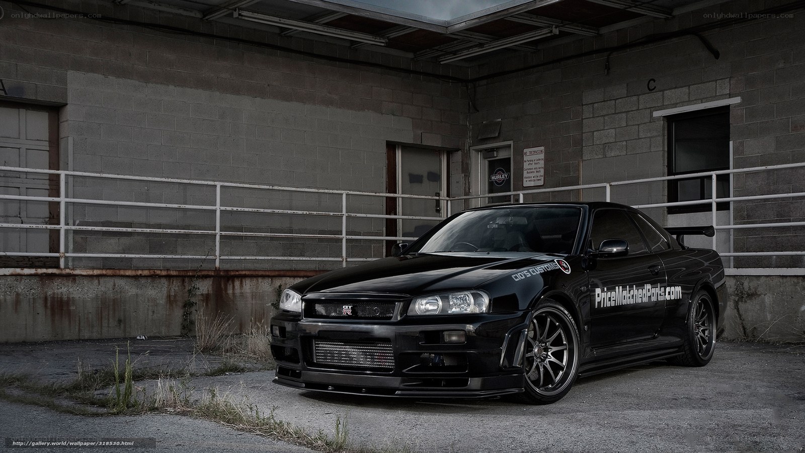 black nissan skyline in garage