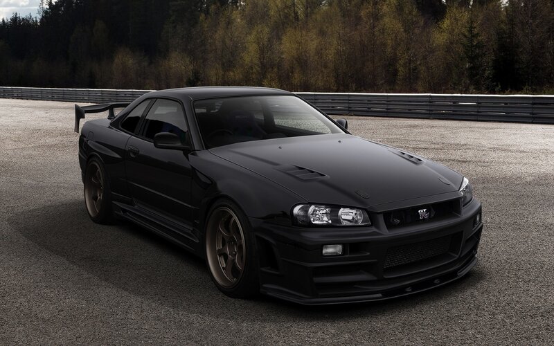 black nissan skyline on racetrack