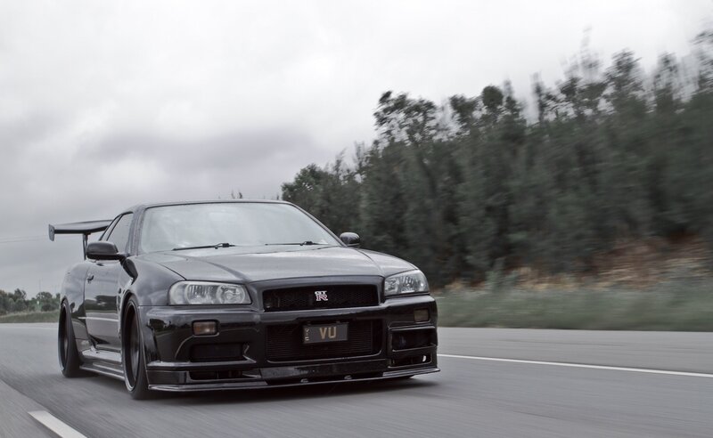 black nissan skyline on road