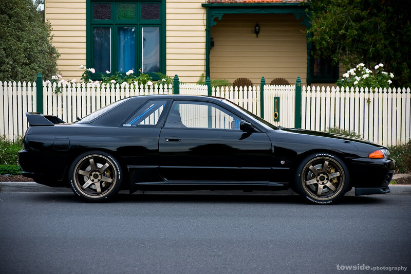 black nissan skyline parked on street
