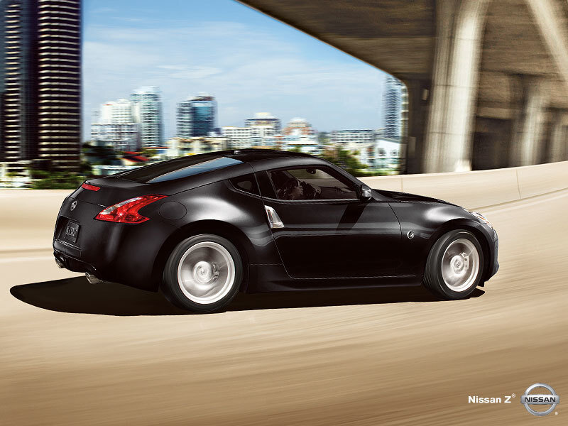Black Nissan Z driving on highway